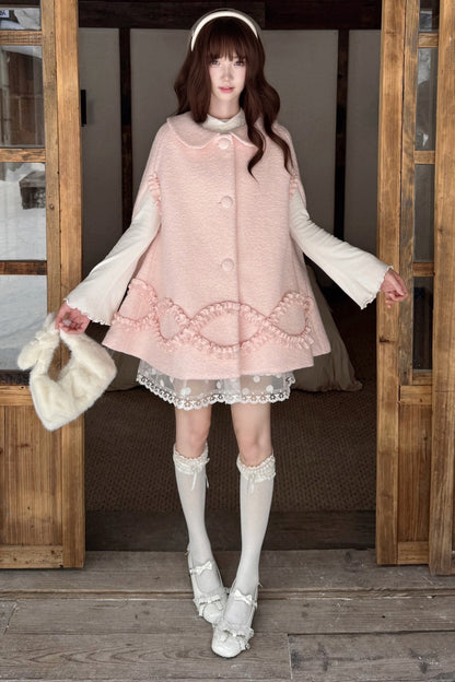 Cappotto di lana rosa con fragole