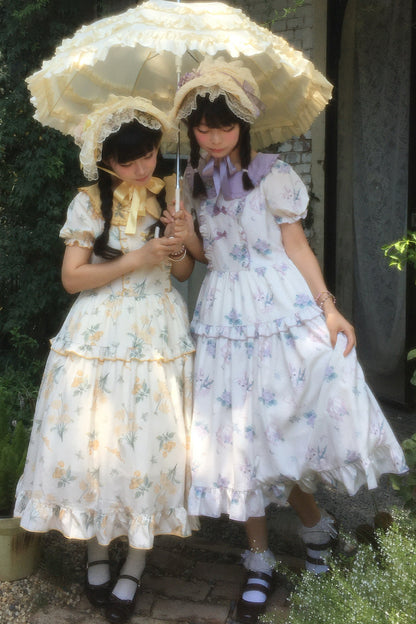 Kleid mit pastoralem Blumenprint und Bubikragen