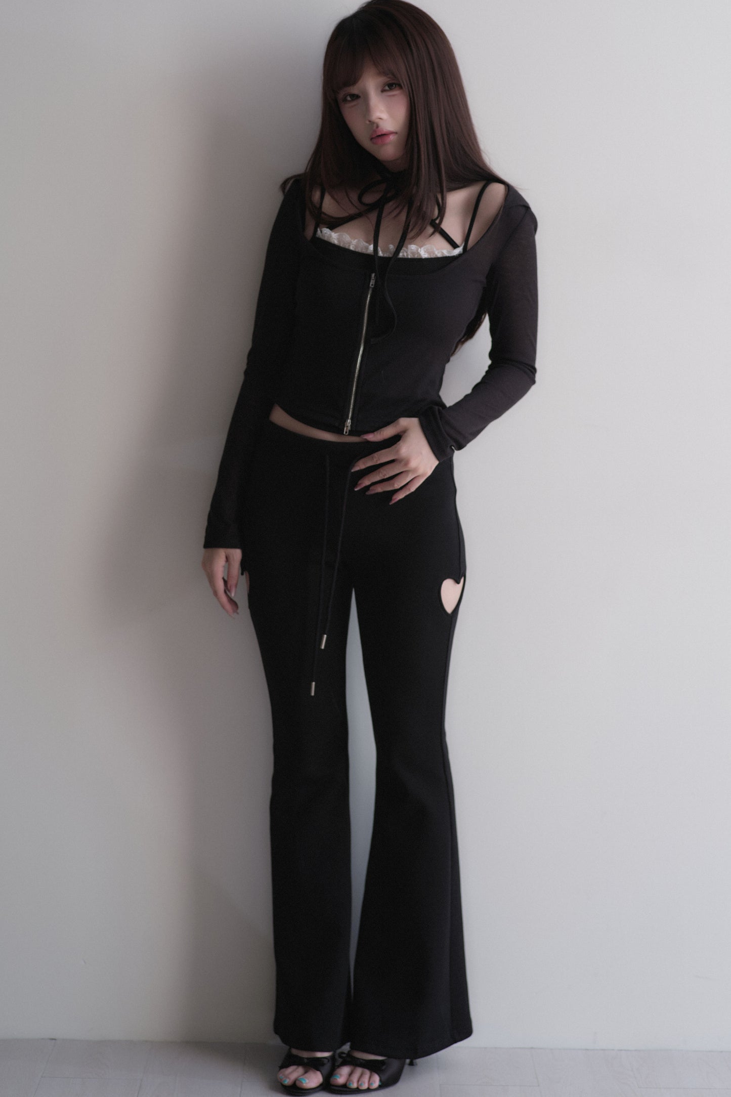 Set con top con fiocco incrociato + pantaloncini in pizzo
