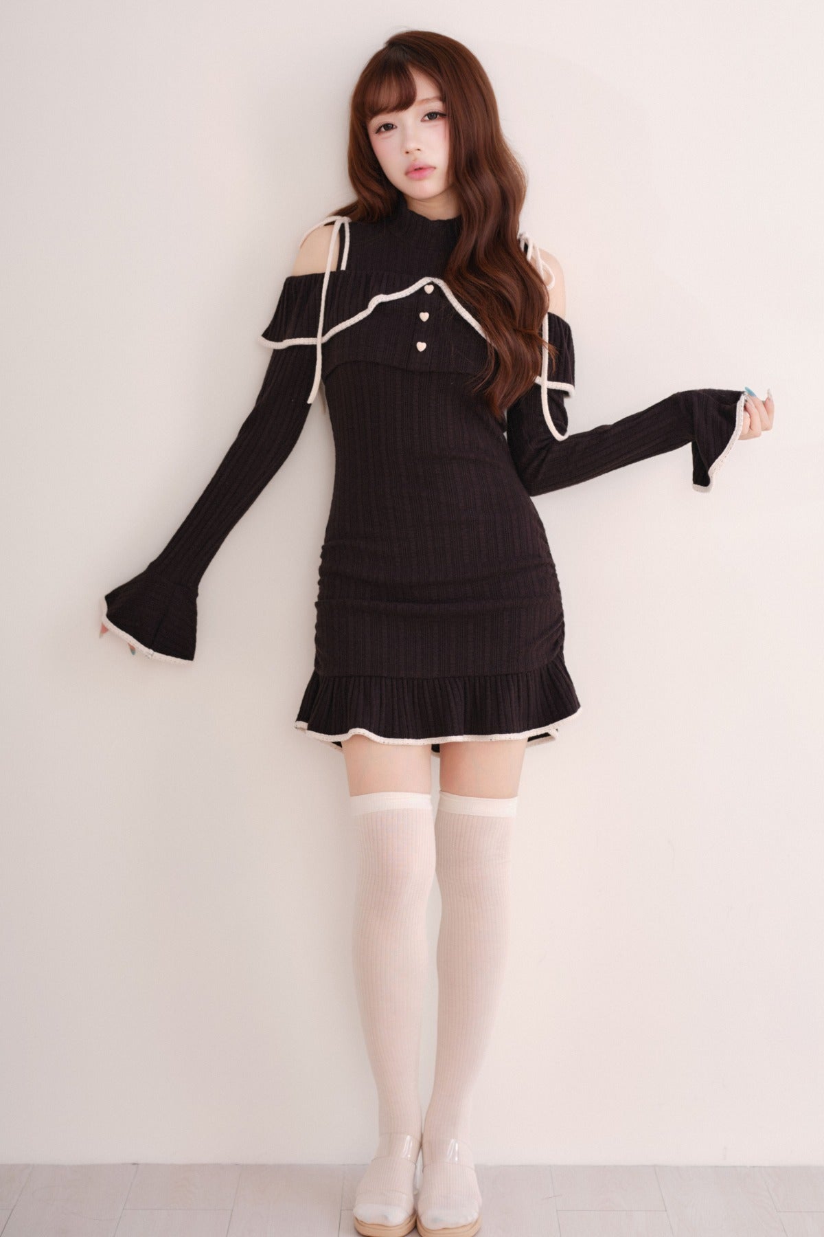 Set con abito gilet in maglia e top