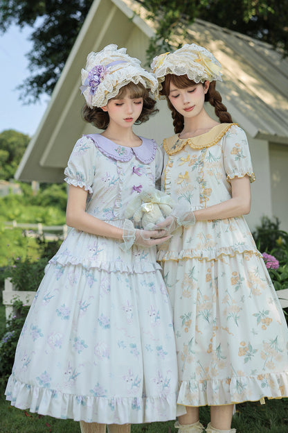 Kleid mit pastoralem Blumenprint und Bubikragen