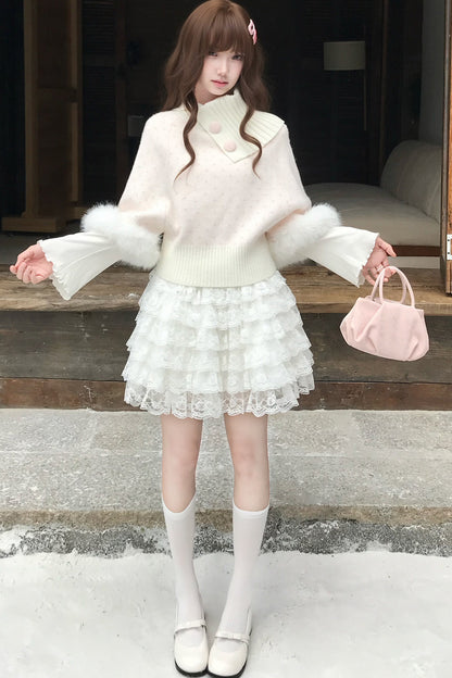 Ensemble jupe et pull cape rose en fausse fourrure
