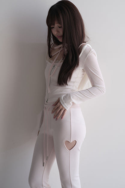 Set con top con fiocco incrociato + pantaloncini in pizzo