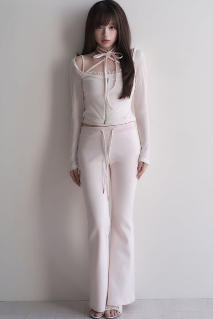 Set con top con fiocco incrociato + pantaloncini in pizzo