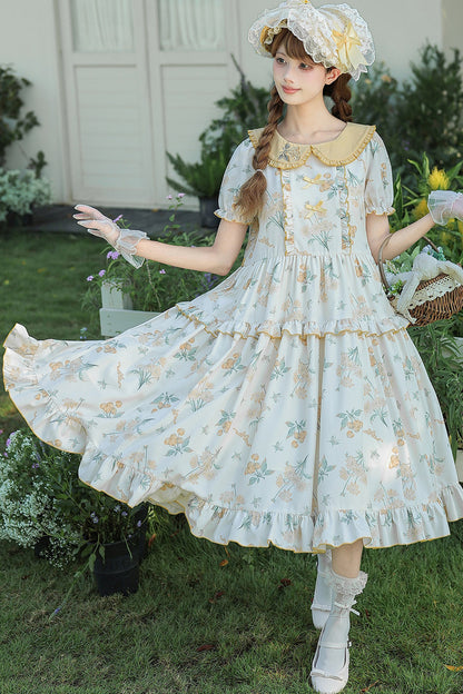 Kleid mit pastoralem Blumenprint und Bubikragen