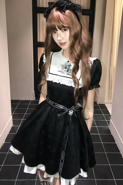 Schwarz-weißes Kleid mit Narzissenstickerei