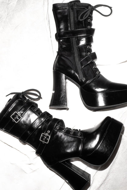 Bottes à plateforme à bout carré et brides croisées inversées