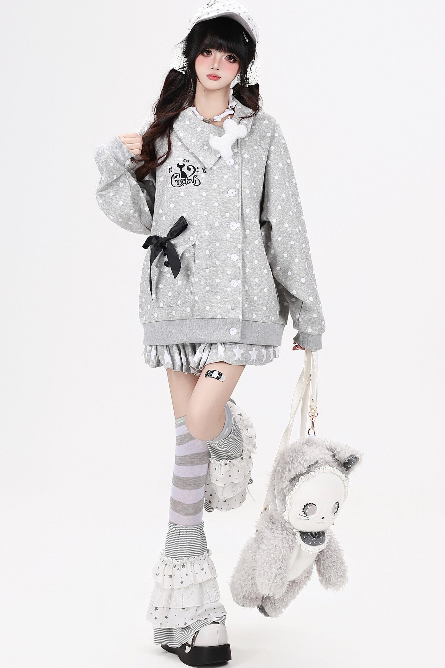 Chaqueta de lunares con gato