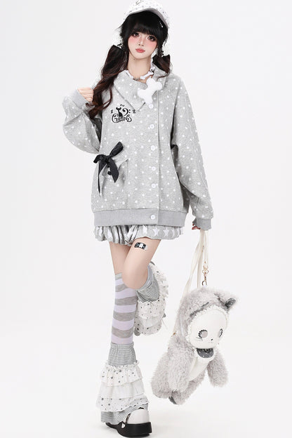 Chaqueta de lunares con gato
