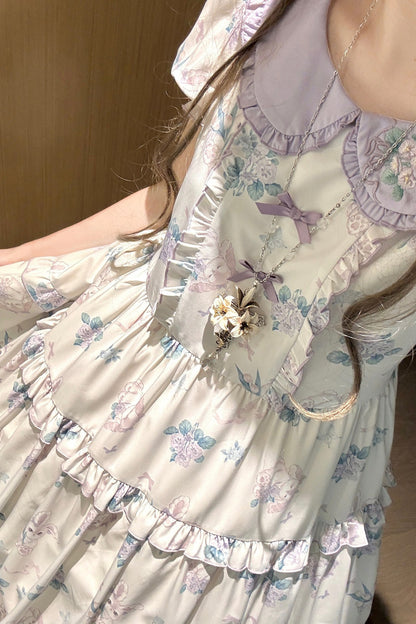 Kleid mit pastoralem Blumenprint und Bubikragen