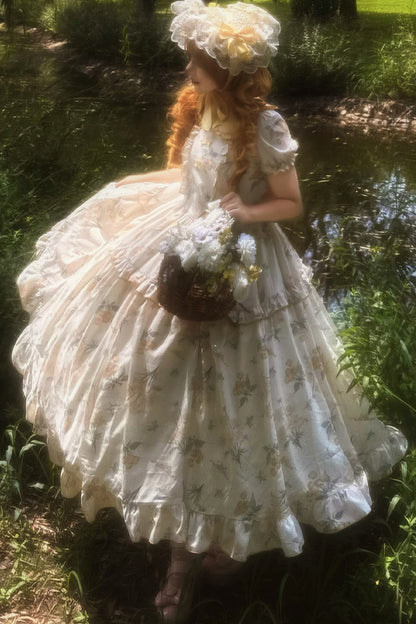 Kleid mit pastoralem Blumenprint und Bubikragen