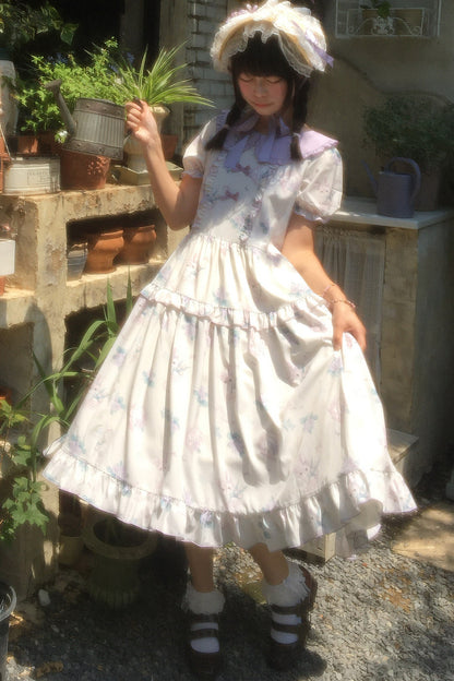 Kleid mit pastoralem Blumenprint und Bubikragen