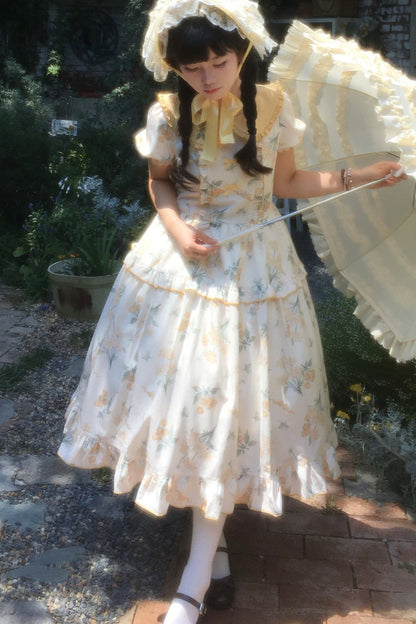 Kleid mit pastoralem Blumenprint und Bubikragen