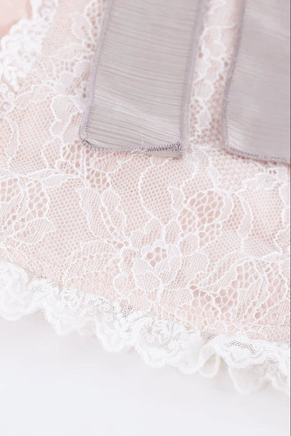 Mädchenhaftes rosa Oberteil mit Schleife + grauer Stufenrock