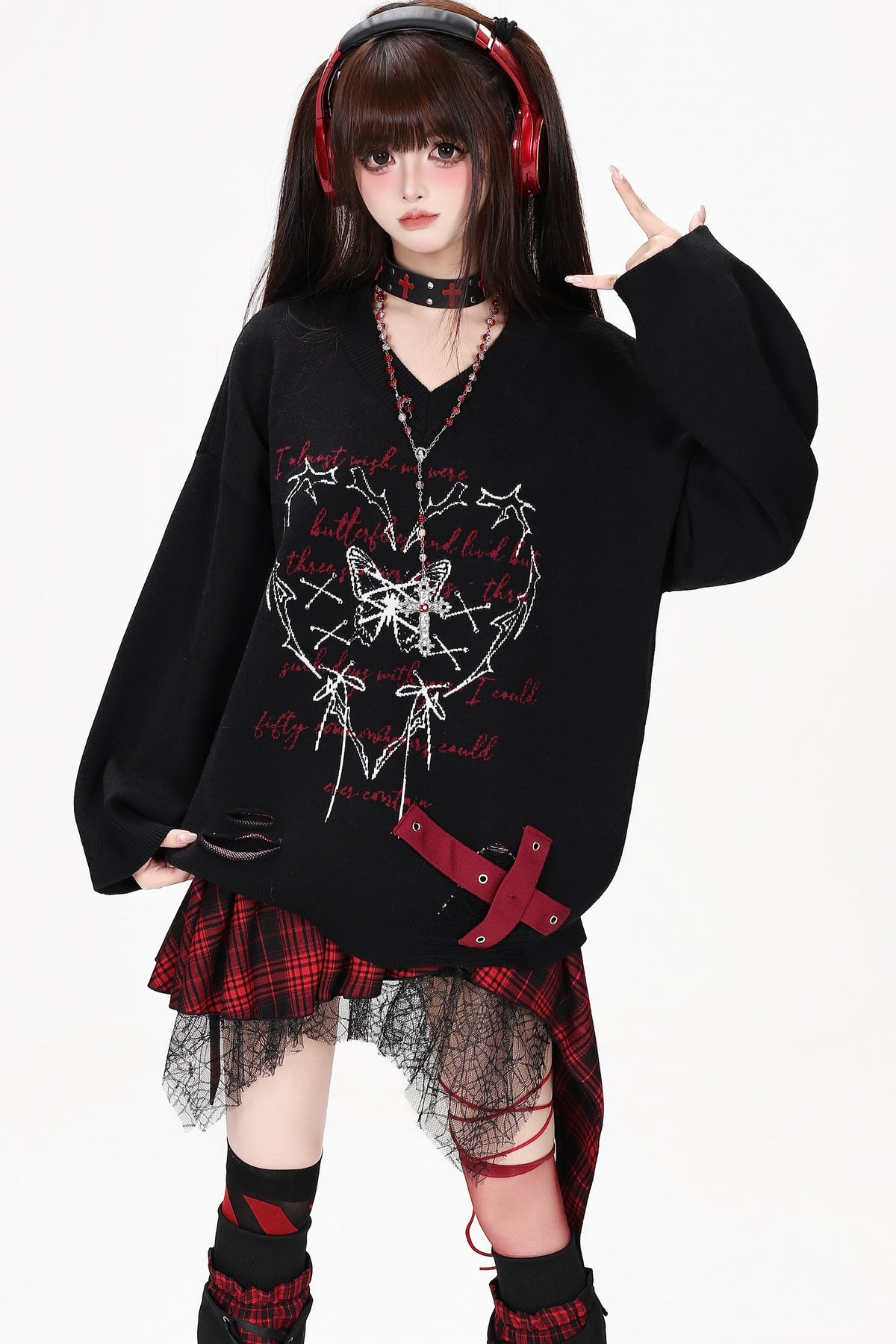 Maglione con scollo a V e farfalla