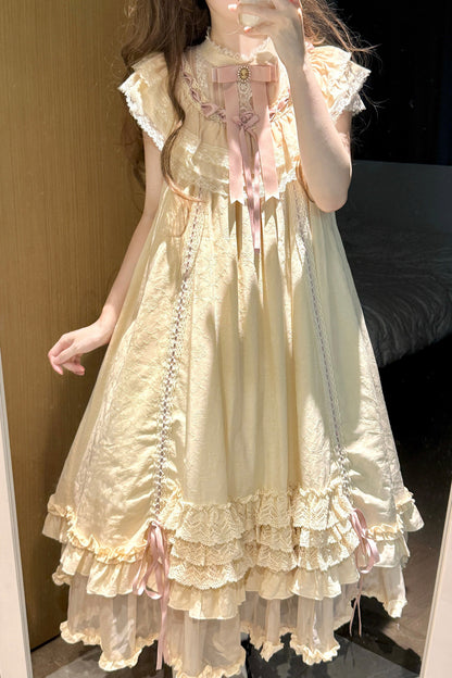Milchtee-rosa Lolita-Kleid mit Puppen-Rüschen