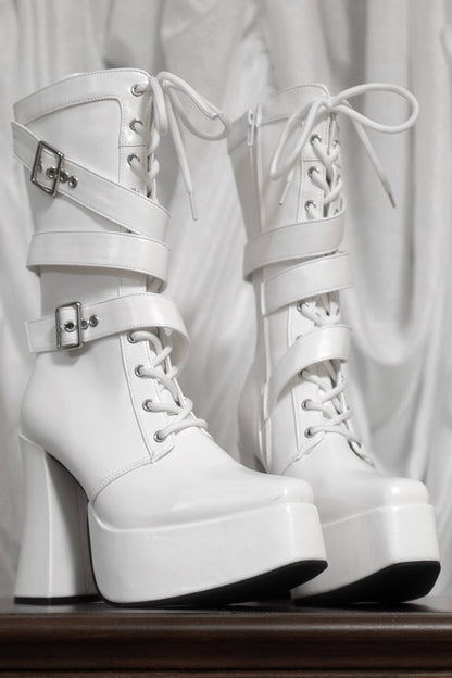 Bottes à plateforme à bout carré et brides croisées inversées