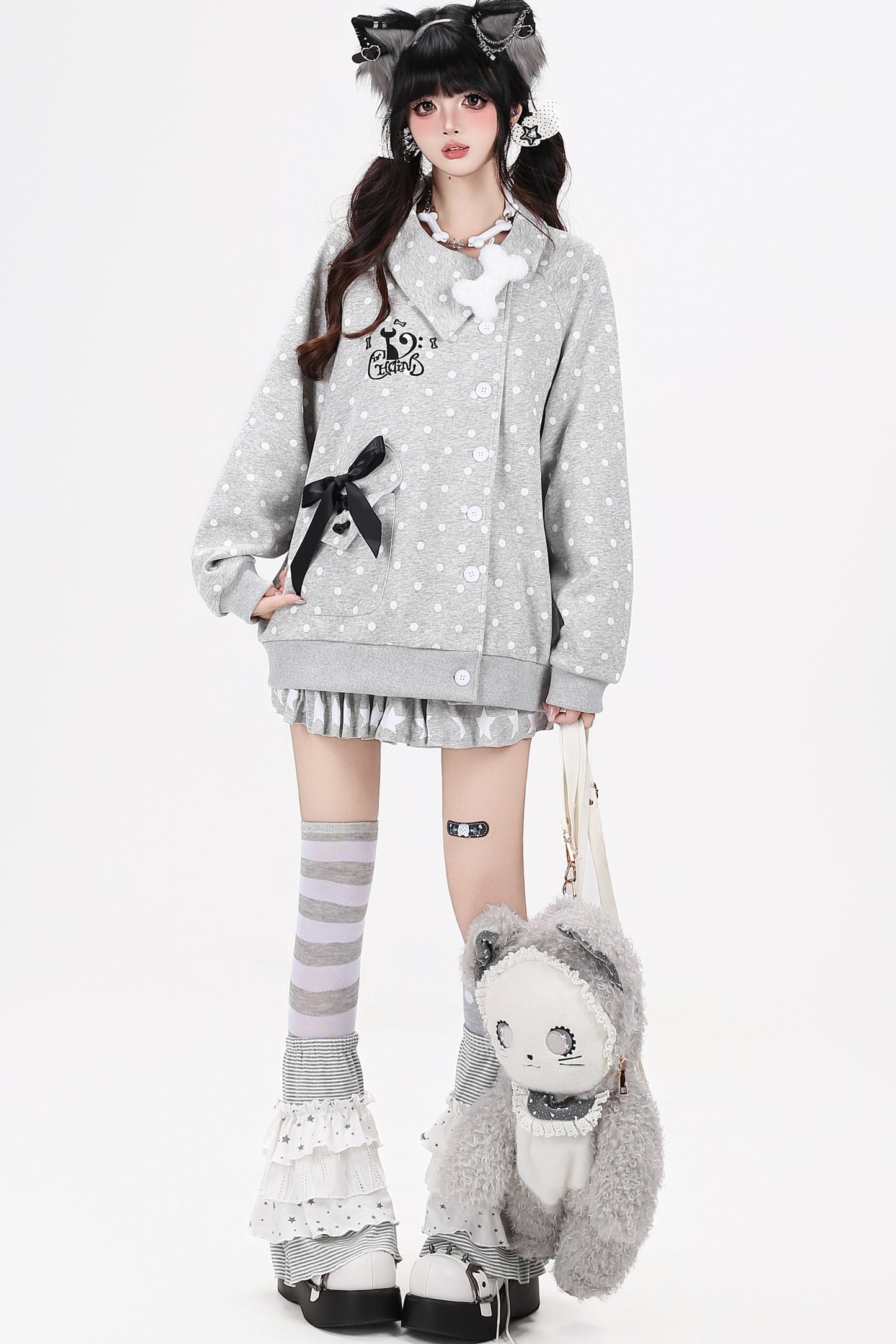 Chaqueta de lunares con gato