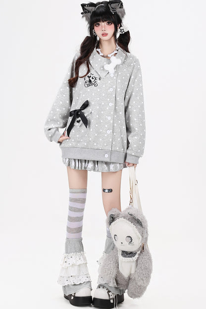 Chaqueta de lunares con gato