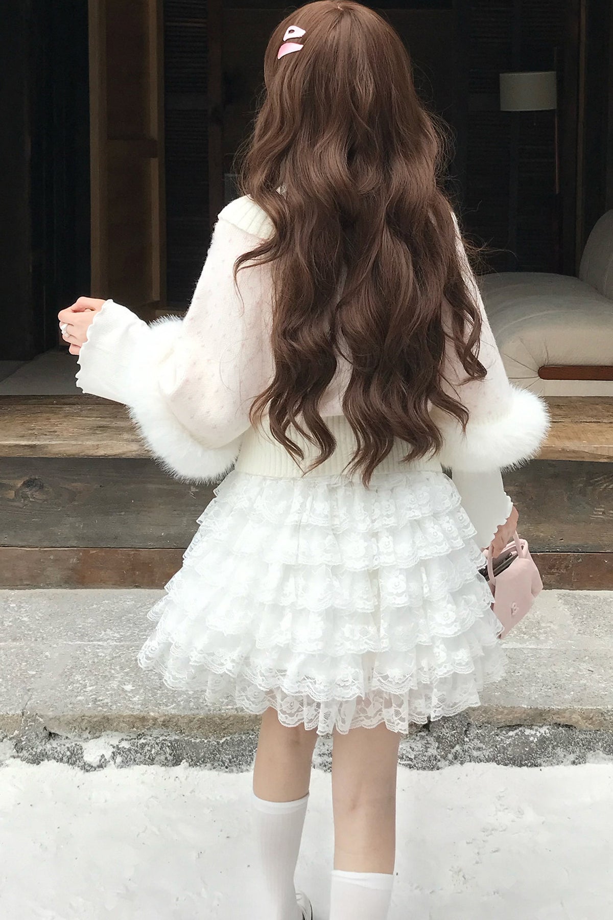 Ensemble jupe et pull cape rose en fausse fourrure