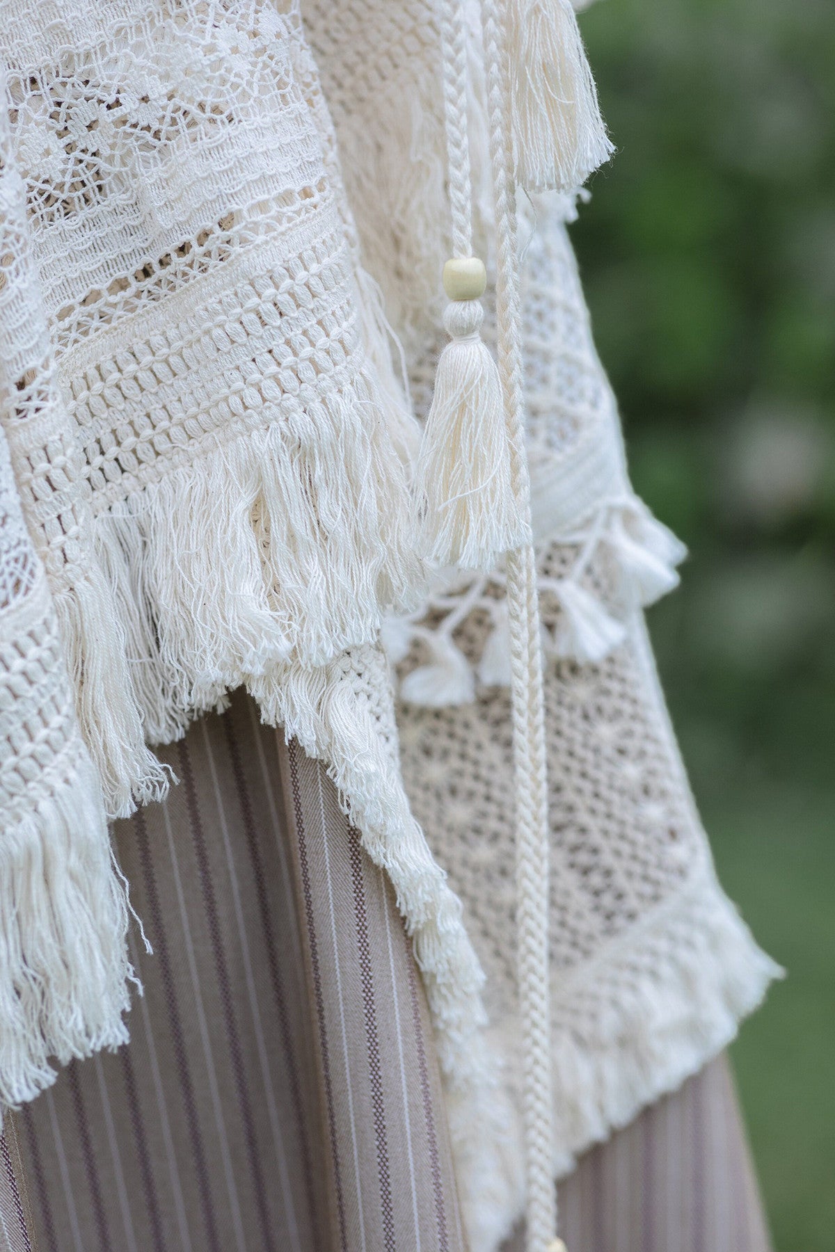Irregular Hollow Lace Tassel Skirt