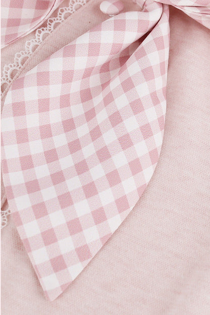 Top rosa femminile + gonna a balze a quadri