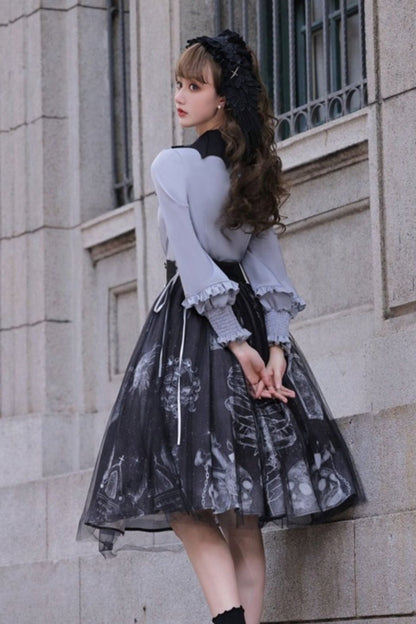 Cross motif bucket color ribbon blouse + side lace -up skirt