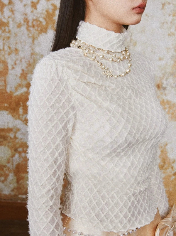 プリーツダイヤモンドミンクトップス