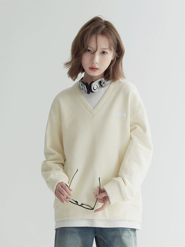 Faux two-piece loose light-colored sweatshirt