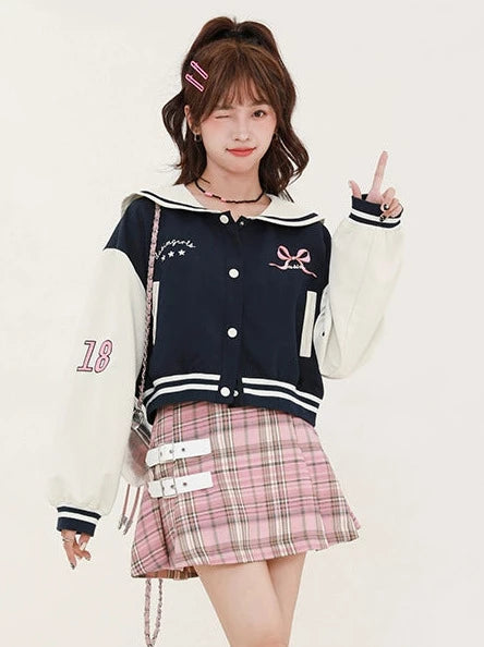 Navy-colored short stadium jacket + checked skirt