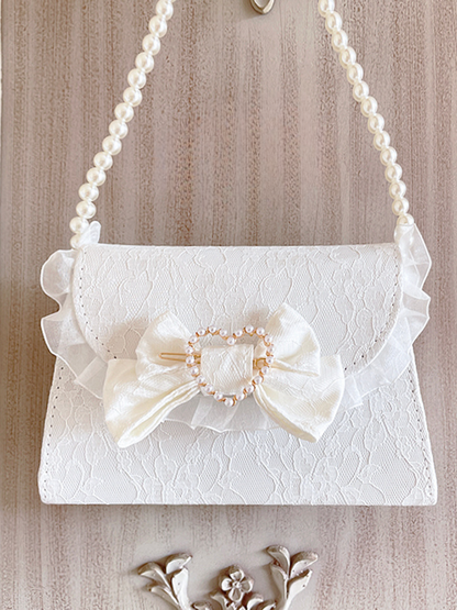 Gurley ribbon handbag with pearl shoulder belt