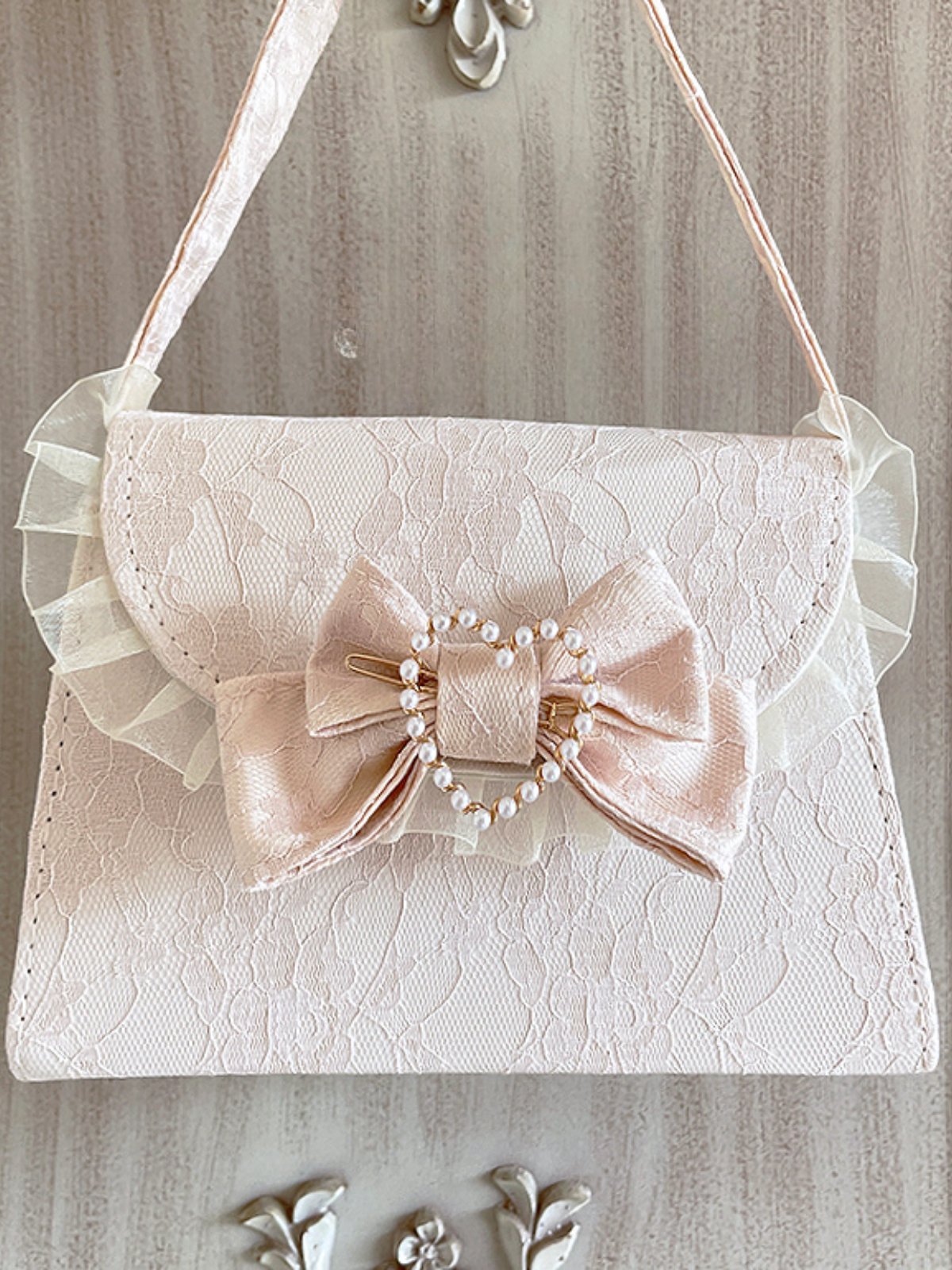 Gurley ribbon handbag with pearl shoulder belt