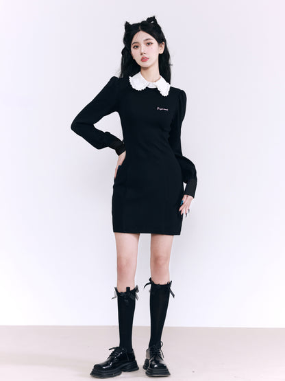 Ruffle collar puff shoulder black knit dress