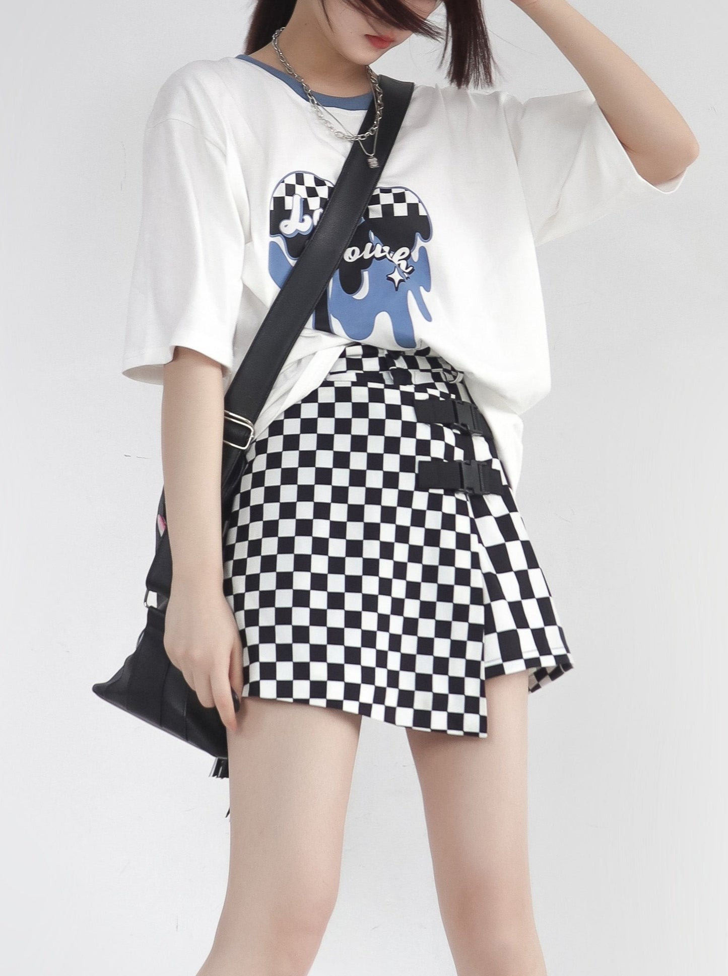 Heart print T-shirt + check miniskirt setup