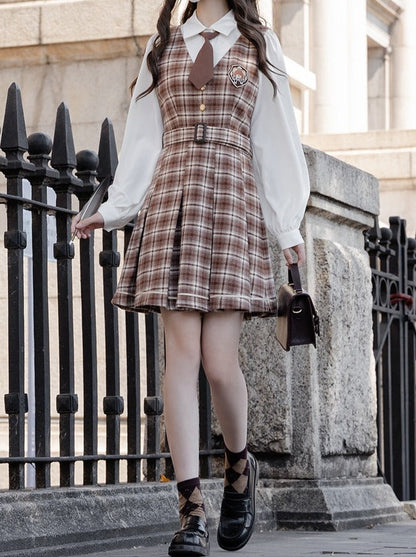 Volume sleeve shirt with tie + check jumper skirt with belt
